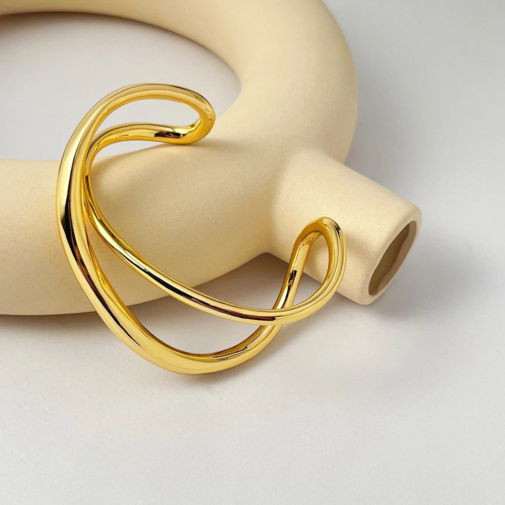 Bracelet ouvert irrégulier Finition dorée