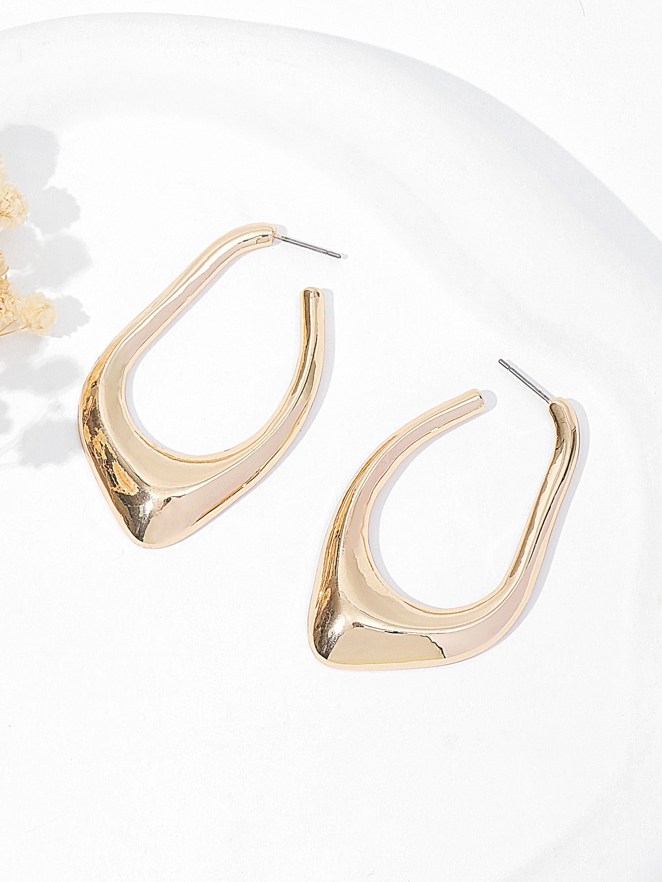 Boucles d’oreilles ajourées irrégulières