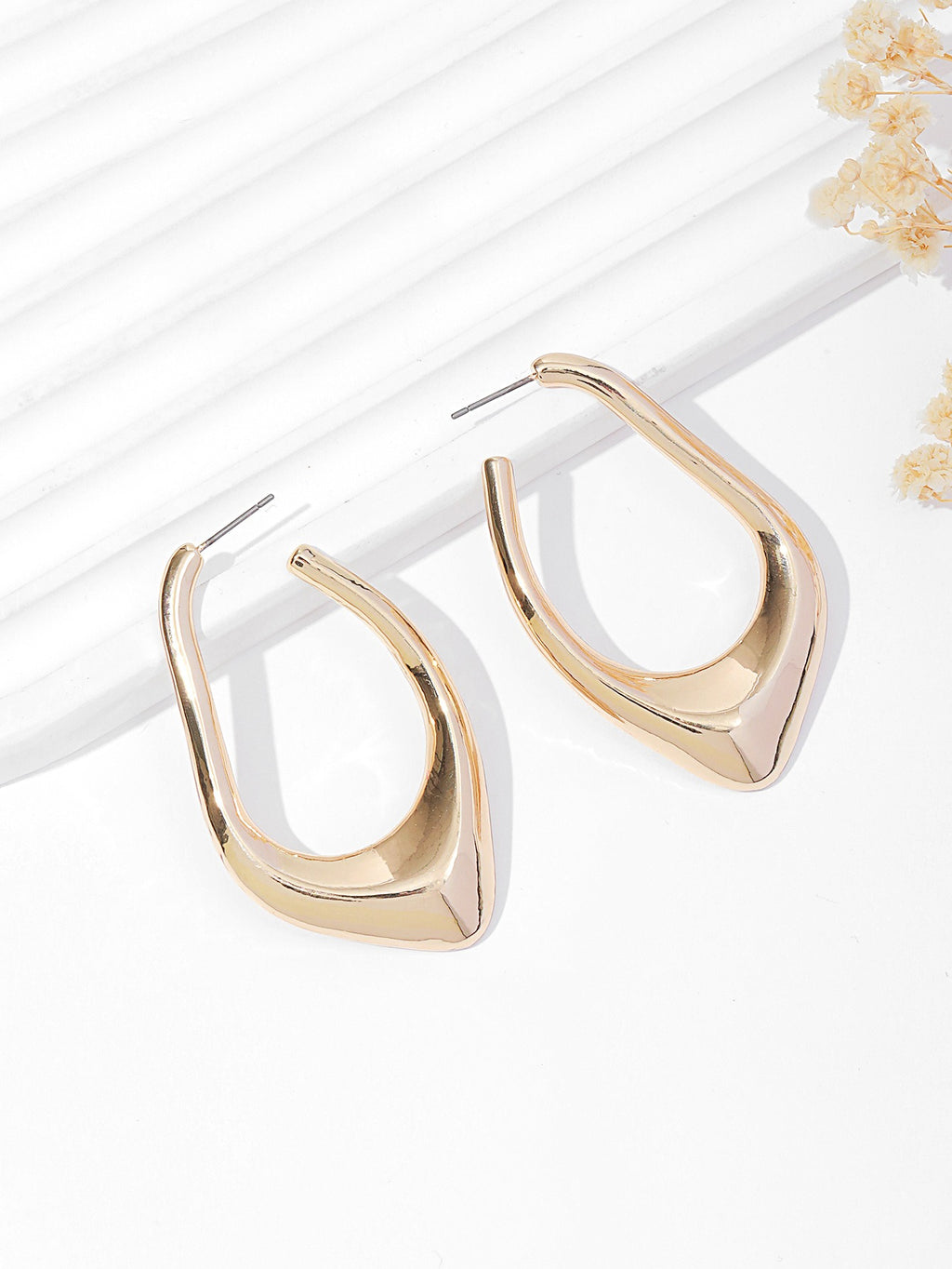 Boucles d’oreilles ajourées irrégulières