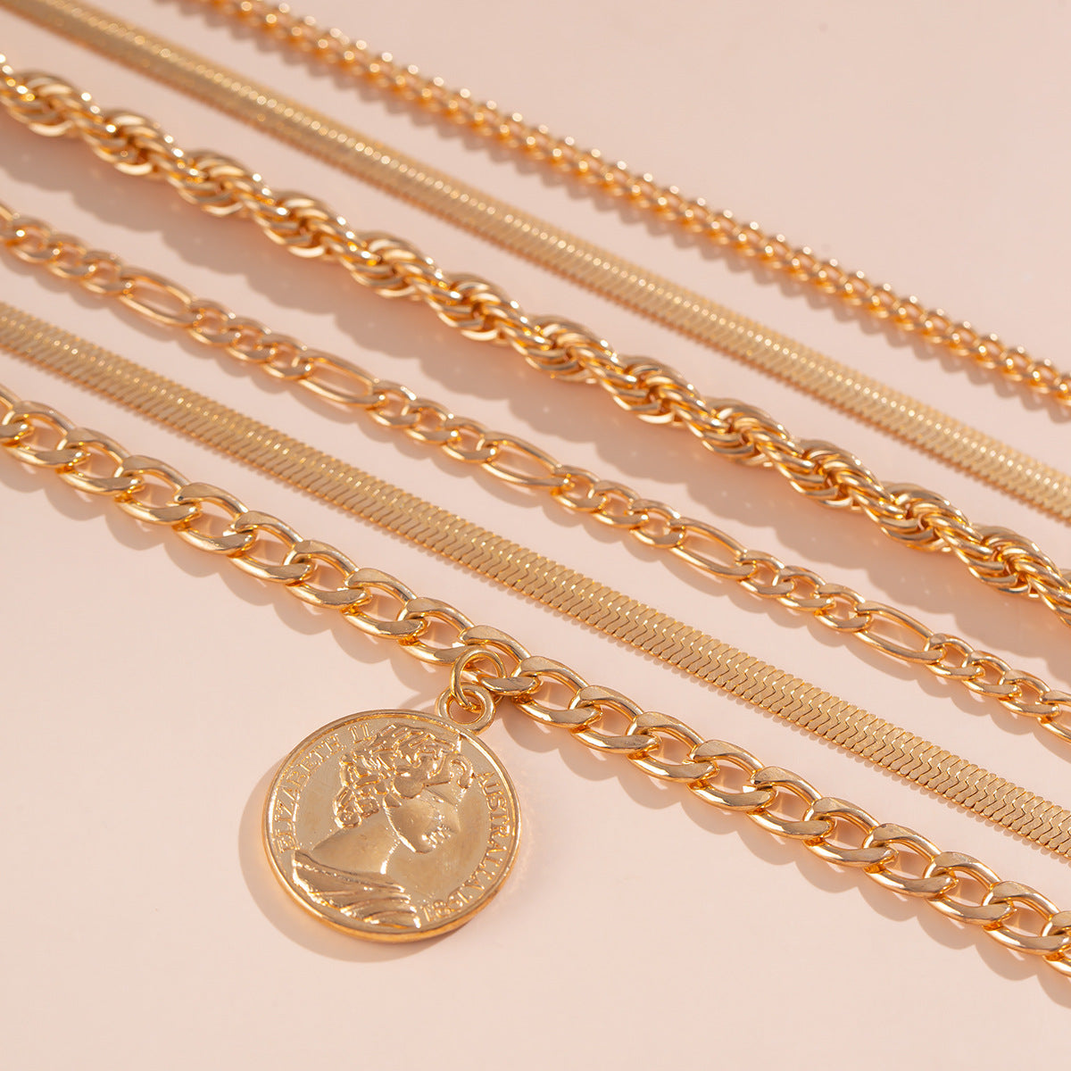 Set de bracelets tendance – Pendentif rond & chaînes serpent plates irrégulières